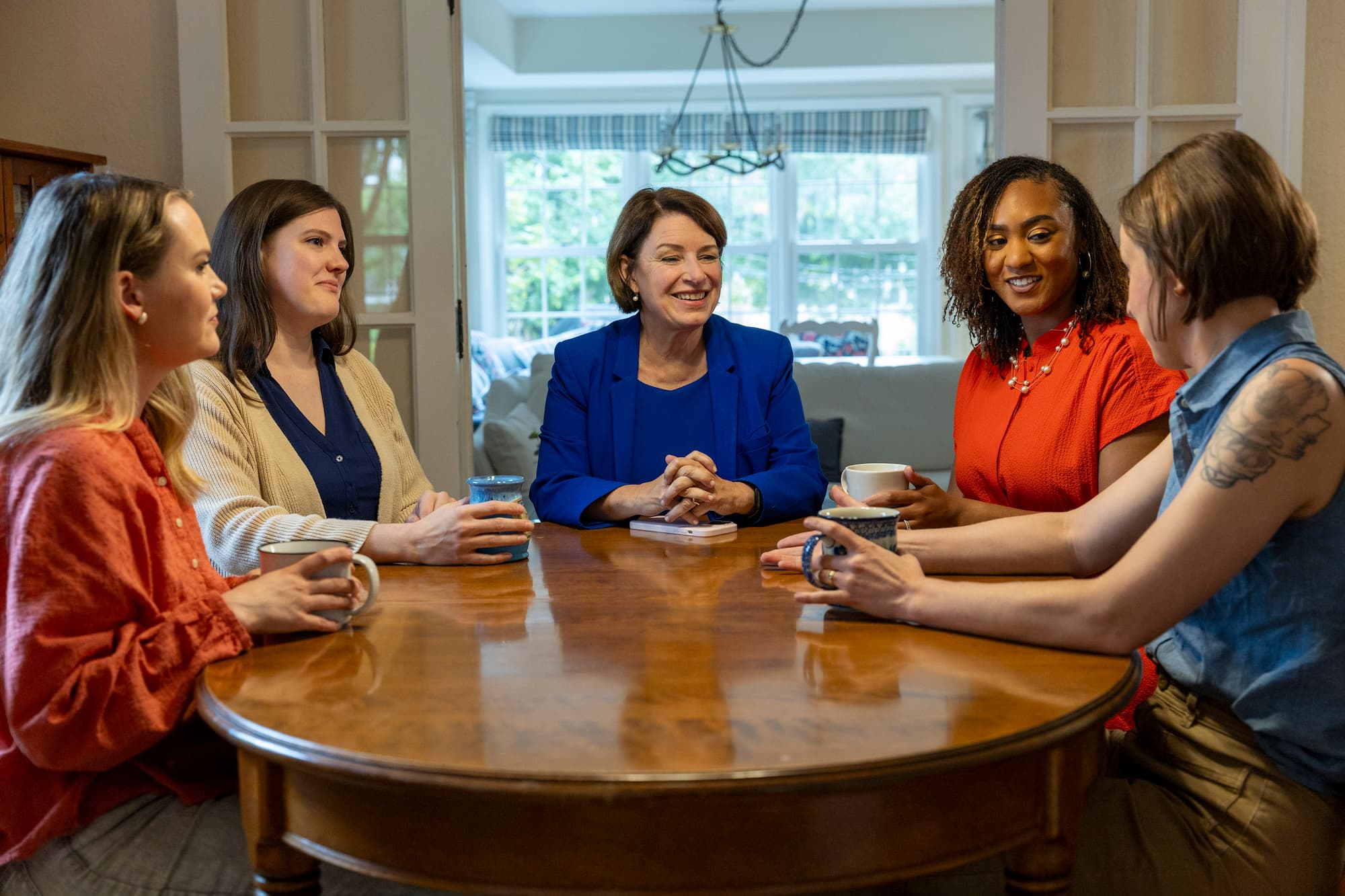 Amy Klobuchar discussing policy with constituents.
